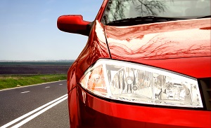 front of a red car