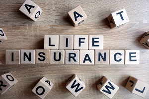 life insurance written on wooden blocks